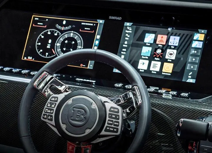 Slide: The Image of Steering wheel and dashboard of 2022 Axopar Brabus Shadow 900 ST boat. - 9