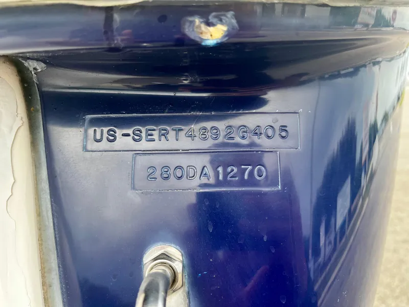 Slide: The Image of Hull identification number on 2005 Sea Ray 280 Sundancer boat. - 12