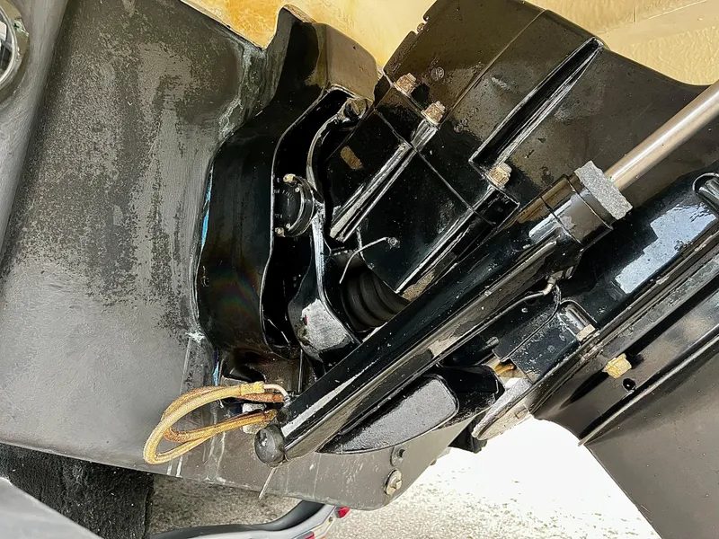 Slide: The Image of Close-up of 2005 Sea Ray 280 Sundancer boat engine components, showcasing mechanical details. - 21