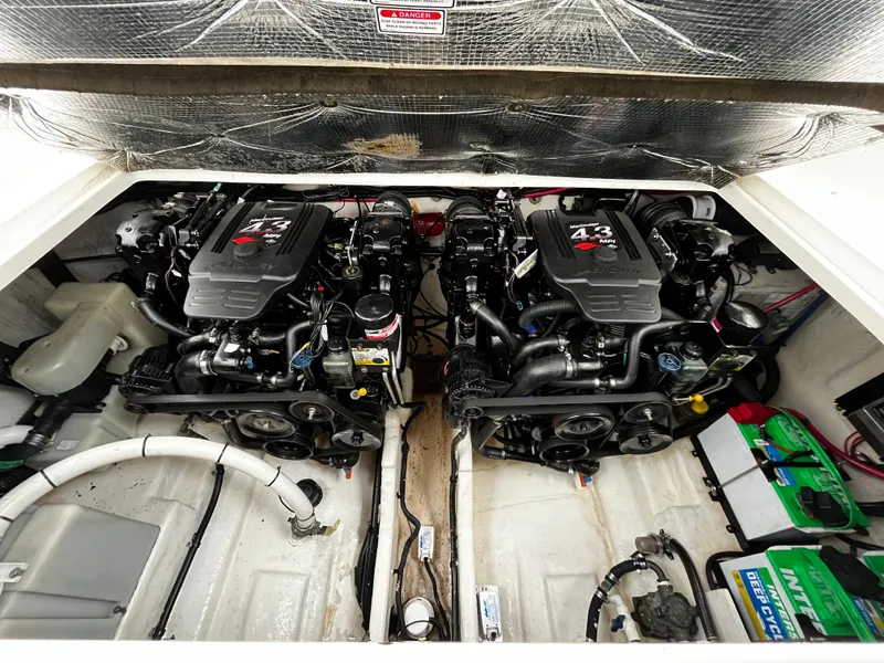 Slide: The Image of Engine compartment of a 2005 Sea Ray 280 Sundancer with twin MerCruiser 4.3 MPI engines. - 28