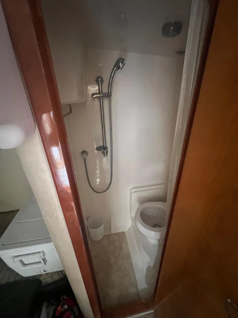Slide: The Image of 2003 Regal Commodore 4260 bathroom with shower and toilet. - 20