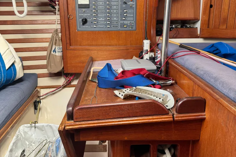Slide: The Image of Interior of a 1984 Endeavour 33 yacht with wooden furnishings. - 13