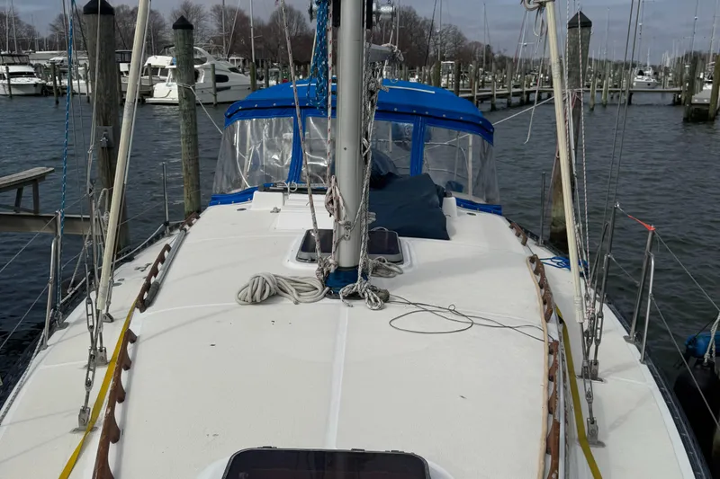 Slide: The Image of 1984 Endeavour 33 sailboat docked in marina. - 3
