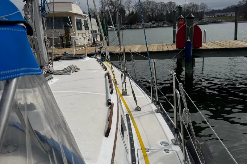 Slide: The Image of 1984 Endeavour 33 sailboat docked at marina. - 5