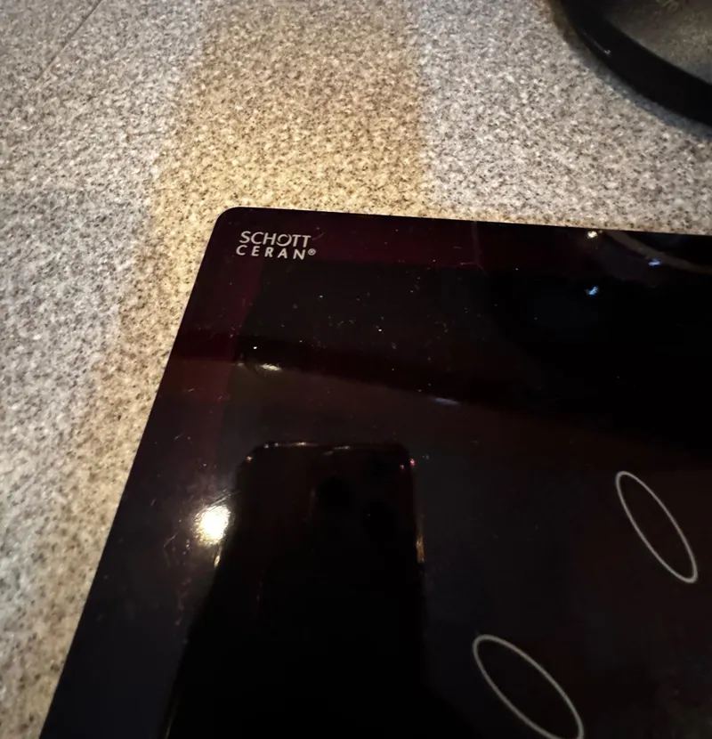 Slide: The Image of Schott Ceran glass-ceramic cooktop on a granite countertop, Formula 40 PC, 2001 model. - 49