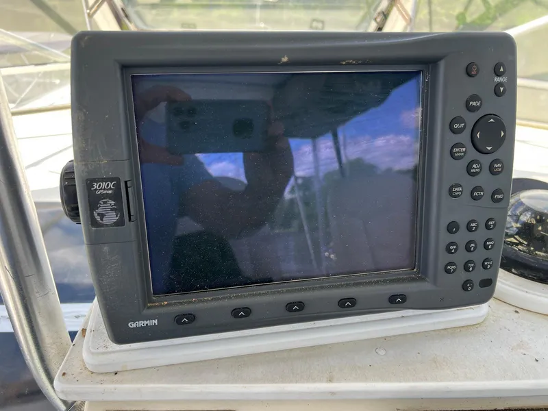 Slide: The Image of Garmin 3010C marine GPS on 1986 Chris-Craft 381 Catalina boat dashboard. - 10