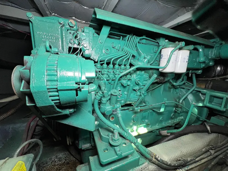 Slide: The Image of Engine of 1986 Chris-Craft 381 Catalina boat, showcasing intricate mechanical components. - 26