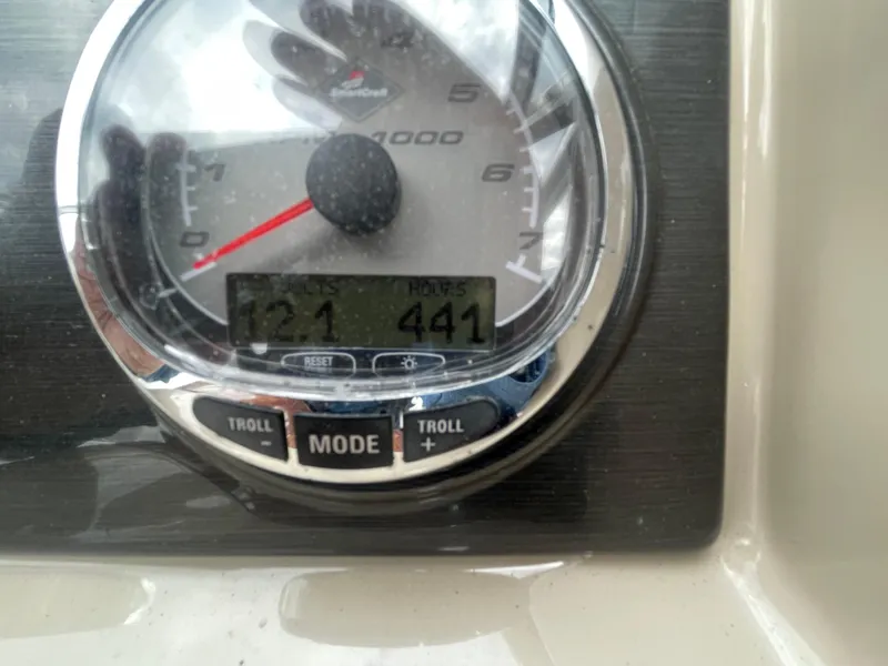 Slide: The Image of Close-up of a 2012 Formula 270 Bowrider boat gauge displaying 441 hours. - 17