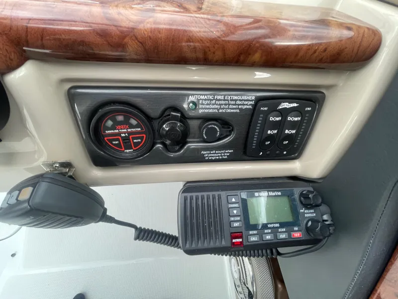 Slide: The Image of Control panel of a 2012 Formula 270 Bowrider boat with radio and fire extinguisher system. - 20