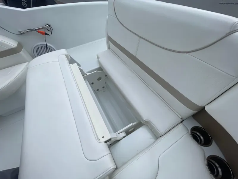 Slide: The Image of 2012 Formula 270 Bowrider interior seating with storage compartment and cup holders. - 37