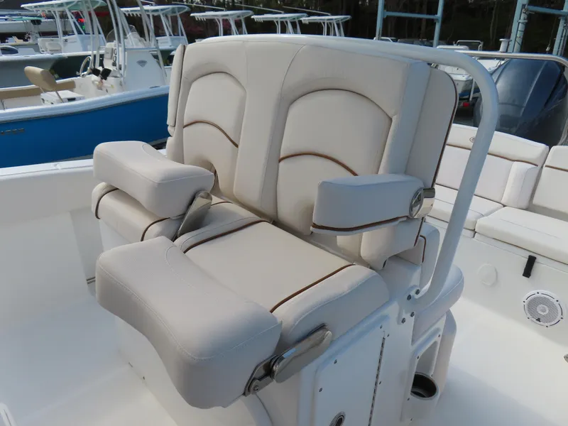 Slide: The Image of 2021 Sea Hunt Ultra 234 boat with comfortable dual seating and armrests. - 23
