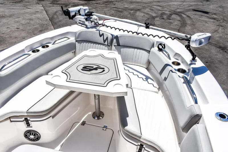Slide: The Image of 2022 Sea Fox 228 Commander boat interior with seating and table, featuring modern design. - 9