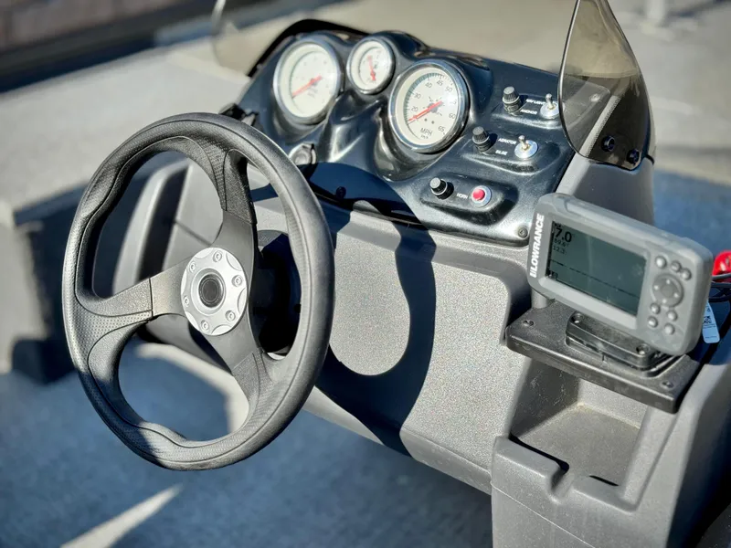 Slide: The Image of 2024 Tracker Pro 170 dashboard with steering wheel and gauges. - 21