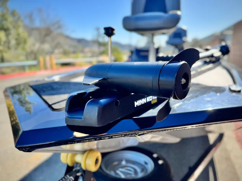 Slide: The Image of 2024 Tracker Pro 170 boat with Minn Kota trolling motor, close-up view. - 7