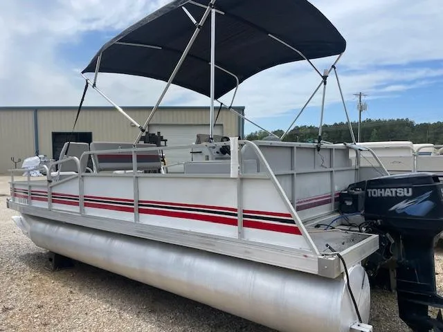 Slide: The Image of 1992 Leisure Island pontoon boat with canopy and Tohatsu outboard motor. - 4
