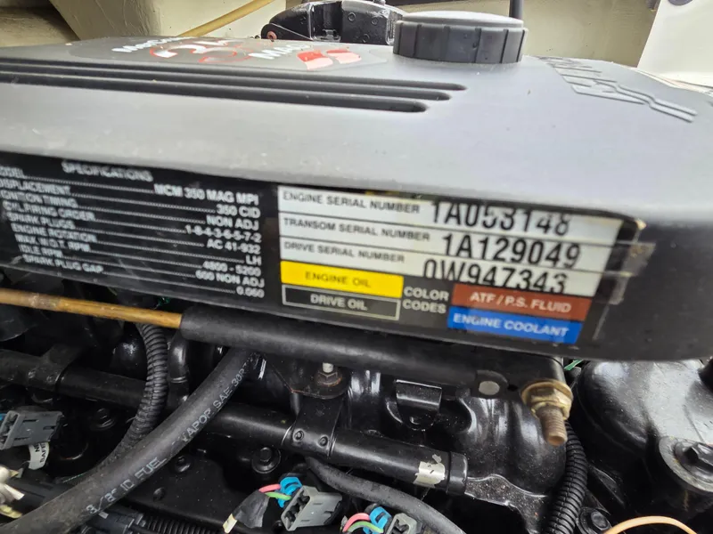 Slide: The Image of Close-up of a 2008 Cobalt 220 engine with serial numbers and specifications. - 12