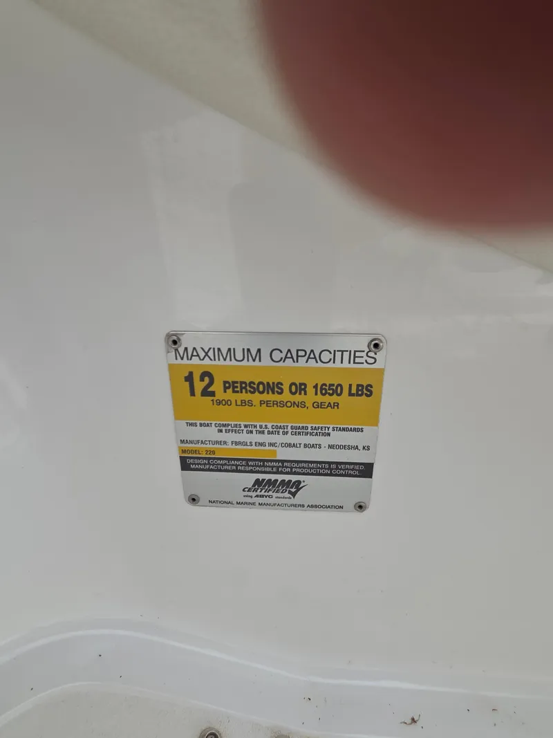 Slide: The Image of Capacity label on 2008 Cobalt 220 boat: 12 persons or 1650 lbs. - 17