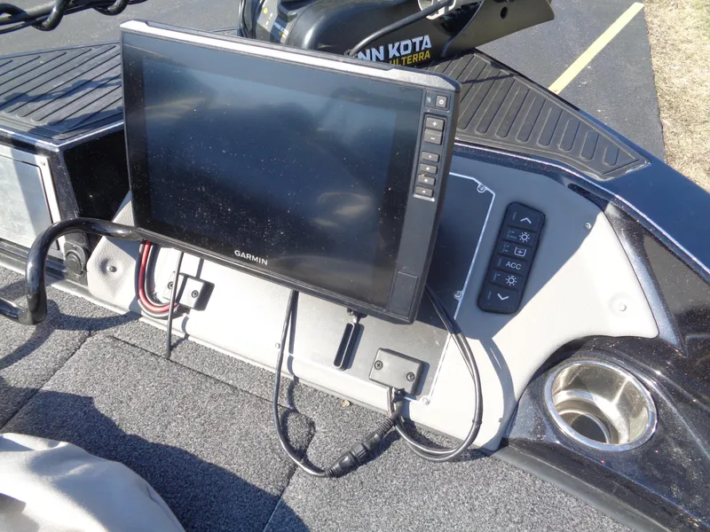 Slide: The Image of 2023 Ranger 621FS Pro boat dashboard with Garmin display and Minn Kota motor. - 5