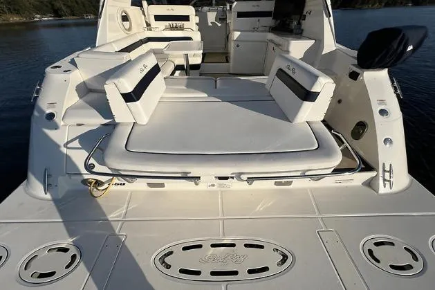 Slide: The Image of 2010 Sea Ray 450 Sundancer yacht with spacious deck and luxurious seating. - 12