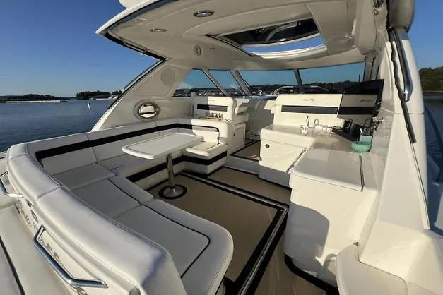Slide: The Image of Luxurious 2010 Sea Ray 450 Sundancer yacht interior with elegant seating and modern amenities. - 15