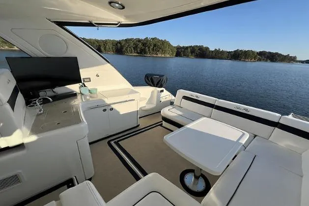 Slide: The Image of Luxurious 2010 Sea Ray 450 Sundancer yacht interior with lake view and modern amenities. - 23