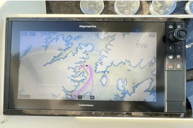 Slide: The Image of Raymarine navigation system on 2010 Sea Ray 450 Sundancer displaying nautical chart. - 33
