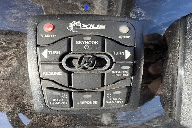 Slide: The Image of Control panel of a 2010 Sea Ray 450 Sundancer boat with Axius system. - 34