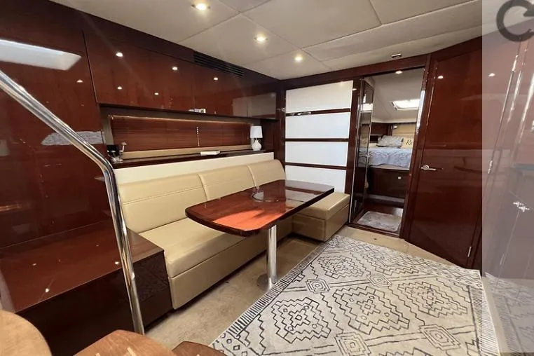 Slide: The Image of Luxurious interior of 2010 Sea Ray 450 Sundancer yacht with elegant seating and modern design. - 41