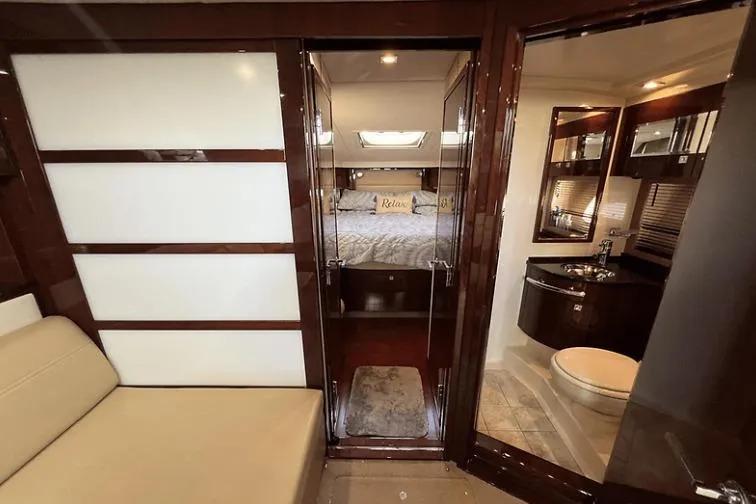 Slide: The Image of Luxurious interior of 2010 Sea Ray 450 Sundancer yacht with bedroom and bathroom. - 47