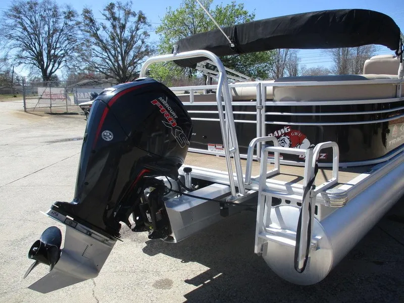 Slide: The Image of 2020 Sun Tracker PARTY BARGE® 22 RF DLX pontoon boat with outboard motor and ladder. - 3