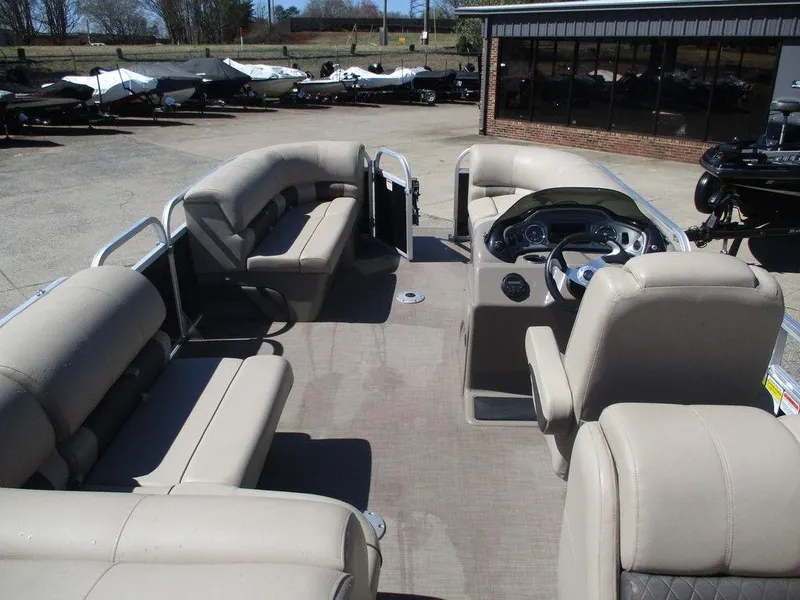 Slide: The Image of 2020 Sun Tracker PARTY BARGE® 22 RF DLX pontoon boat with spacious seating and modern helm. - 6