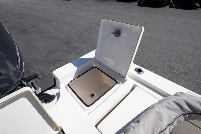 Slide: The Image of Open storage compartment on 2013 Pathfinder 2400 TRS boat deck. - 7