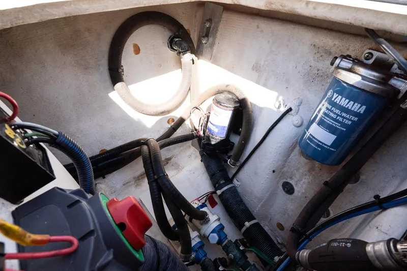 Slide: The Image of Engine compartment of a 2013 Pathfinder 2400 TRS boat with Yamaha fuel filter. - 9
