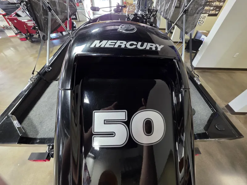 Slide: The Image of 2024 Tracker Super Guide V-16 SC with Mercury 50 HP engine, showroom display. - 9