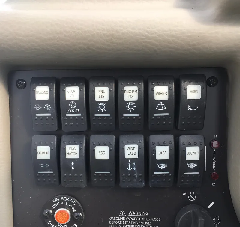 Slide: The Image of Control panel of a 2018 Crownline 264 CR boat with labeled switches. - 8