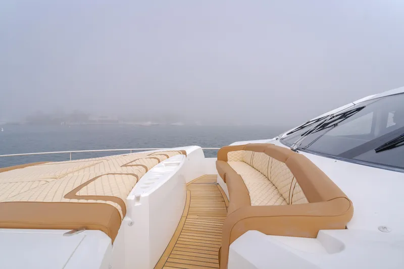 Slide: The Image of Luxurious 2017 Sunseeker 75 Yacht with spacious deck and elegant seating. - 16