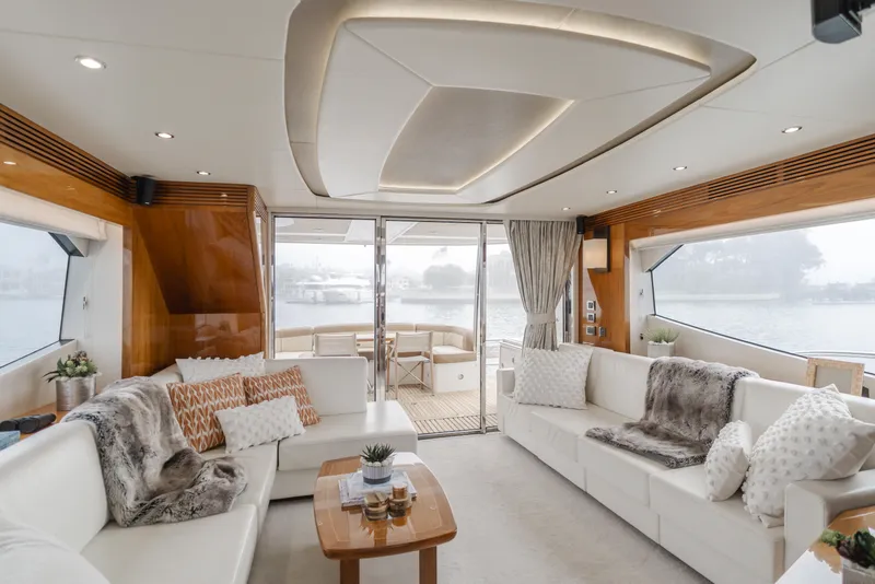 Slide: The Image of Luxurious interior of 2017 Sunseeker 75 Yacht with elegant seating and panoramic windows. - 28