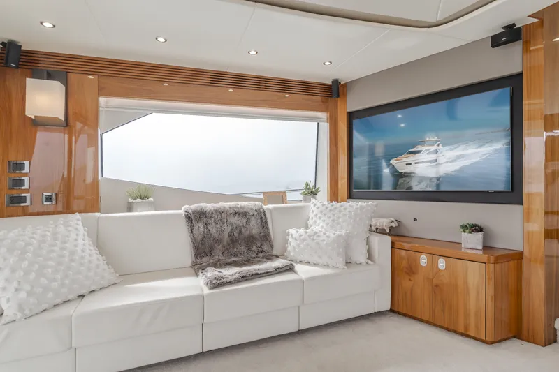 Slide: The Image of Luxurious interior of 2017 Sunseeker 75 Yacht with plush seating and large window. - 32