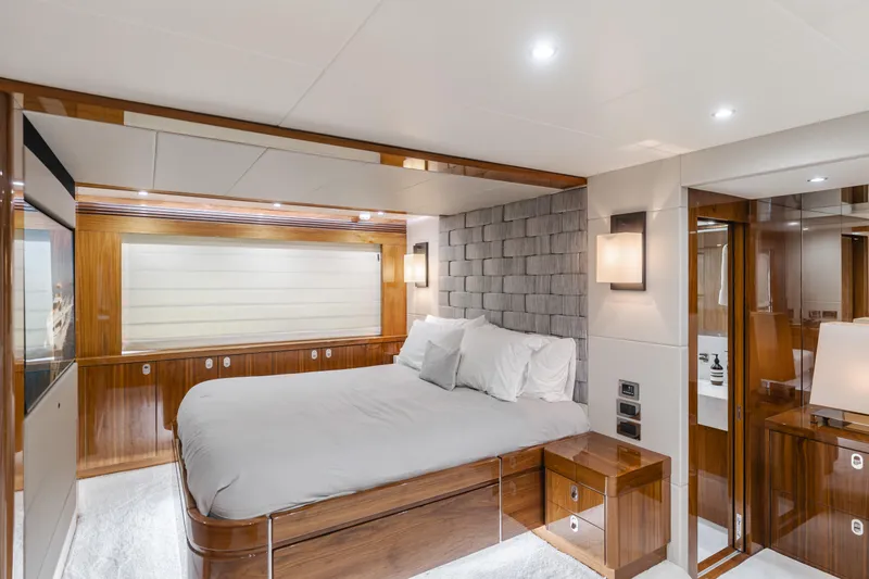 Slide: The Image of Luxurious bedroom interior of 2017 Sunseeker 75 Yacht with modern design and elegant wood finishes. - 36