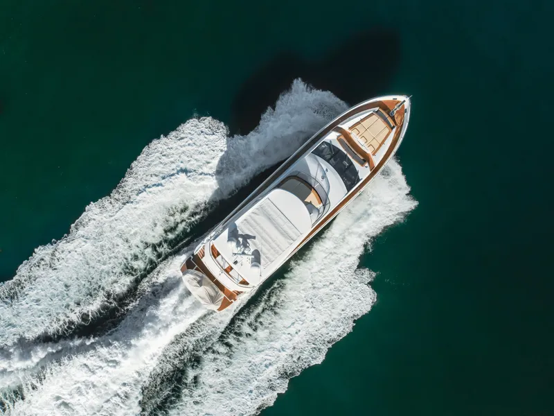 Slide: The Image of Sunseeker 75 Yacht 2017 cruising on open water, aerial view. - 4