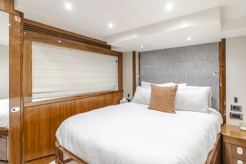 Slide: The Image of Luxurious bedroom interior of 2017 Sunseeker 75 Yacht with elegant wood finishes. - 45