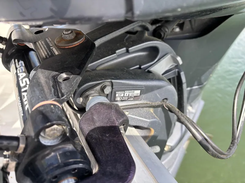 Slide: The Image of Close-up of a 2022 Sea Hunt Ultra 219 boat engine components. - 17