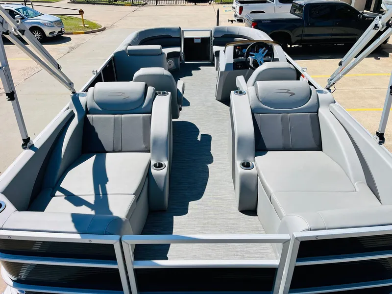 Slide: The Image of 2021 Bennington SX 22 Stern Lounge pontoon boat with spacious seating and modern design. - 11