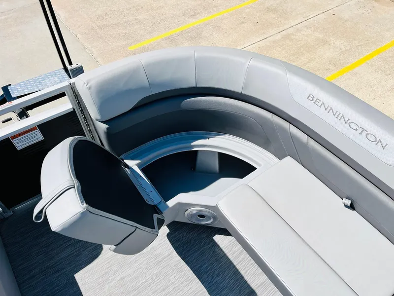 Slide: The Image of 2021 Bennington SX 22 Stern Lounge with gray seating and storage compartment. - 20