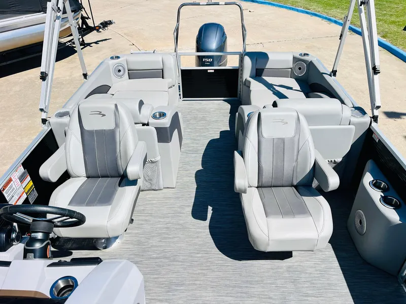 Slide: The Image of 2021 Bennington SX 22 Stern Lounge interior with gray seating and modern design. - 22