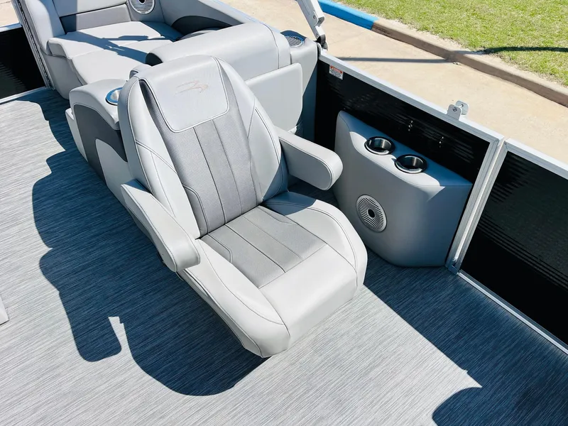 Slide: The Image of 2021 Bennington SX 22 Stern Lounge with gray seating and cup holders on deck. - 23