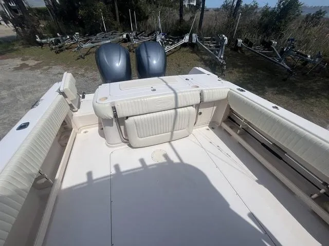 Slide: The Image of 2007 Grady-White 282 Sailfish boat deck with twin outboard motors. - 7