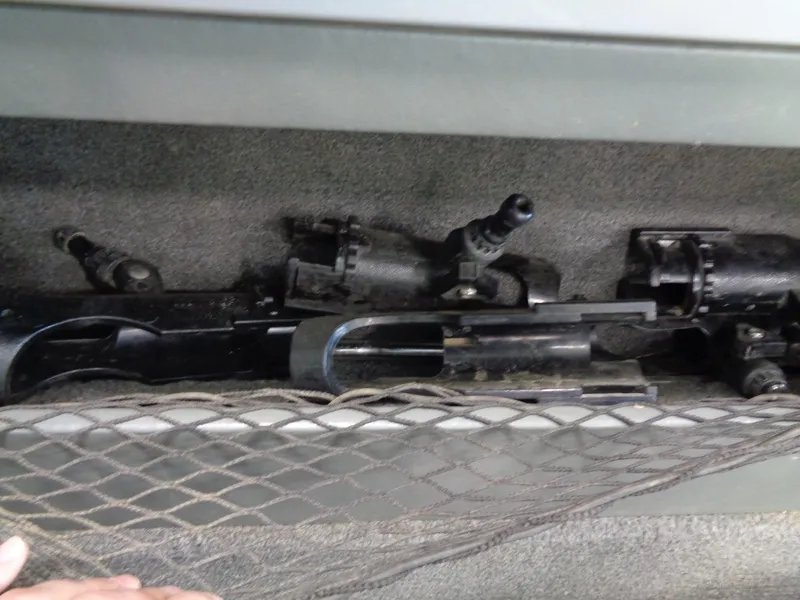 Slide: The Image of Storage compartment in a 2003 Lund 1800 Fisherman OB boat. - 22