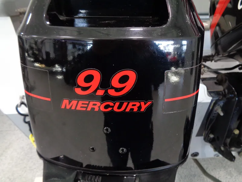 Slide: The Image of Mercury 9.9 horsepower outboard motor on a 2003 Lund 1800 Fisherman OB boat. - 23
