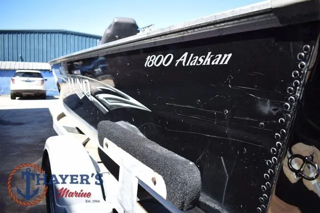 Slide: The Image of 2015 Lund 1800 Alaskan boat on trailer at Thayer's Marine dealership. - 28